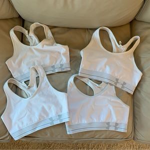 Set of 4 Under Armor Heat Gear sports bras.